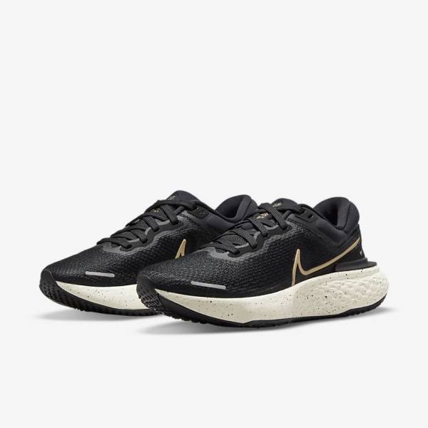 Women's Nike ZoomX Invincible Run Flyknit Road Running Shoes Black / Metal Gold | NK751DNQ